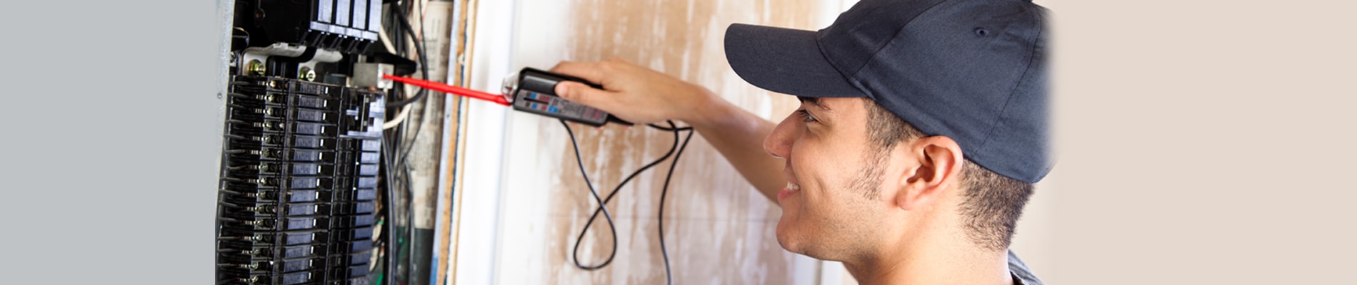 electrician working on panel