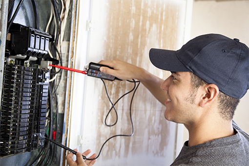 electrician working on panelbox